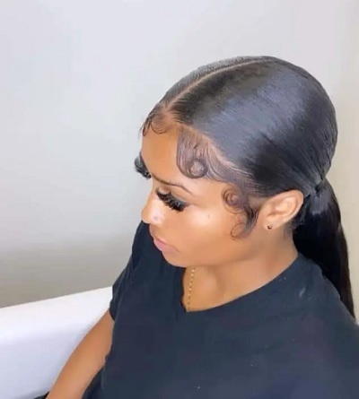 sleek low ponytail with baby hair