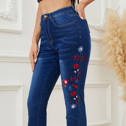 Leisure embroidered high waisted elastic trimmed jeans