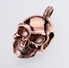Skull pendant with rose gold color coating