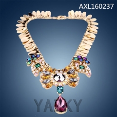 Fashion necklace with gold leafs and colorful crystals pendants