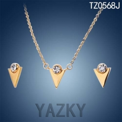 Triangle jewelry set in gold color with shiny zircons