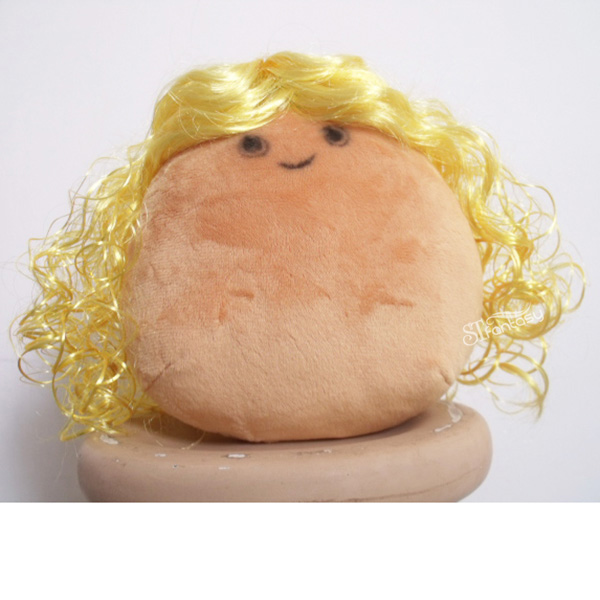 Kinky curly yellow doll