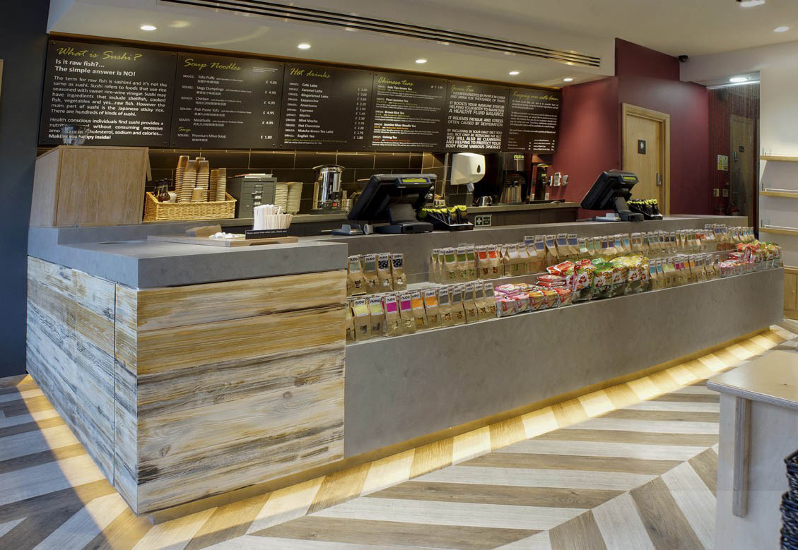 grey solid surface and wood snacks bar counter