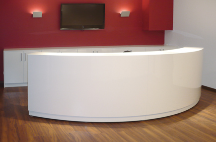 Curved office reception desk with file cabinet