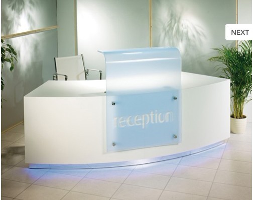 White office reception counter with logo