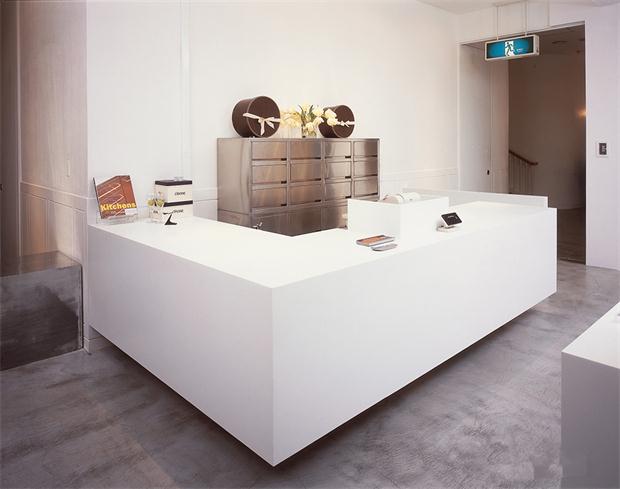 L shape white office reception counter 
