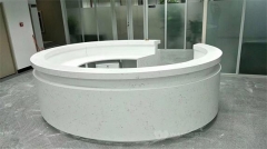 Round artificial stone large reception desk on the hall