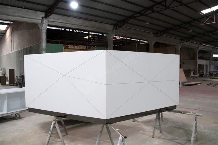 White solid surface reception desk 