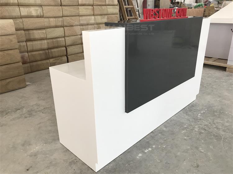 The side of corian front counter 