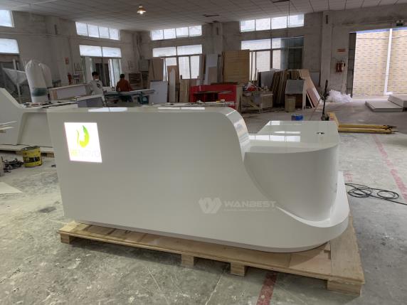 Solid White LED-Lit L-Shaped Reception Desk with Sleek Surface