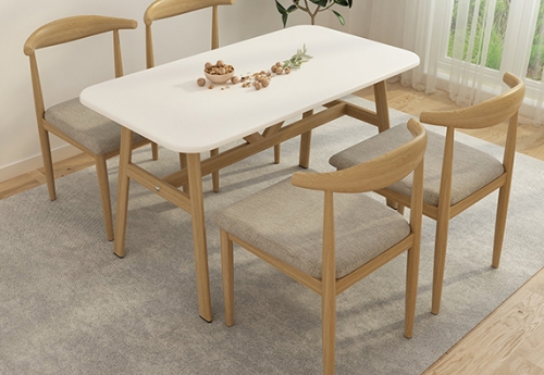 modern white solid surface dining room table with chairs