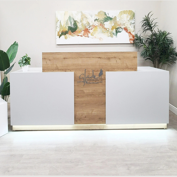 marble and wood material reception desk for one person
