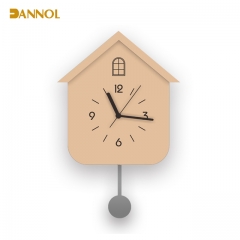 House shaped pendulum wall clock