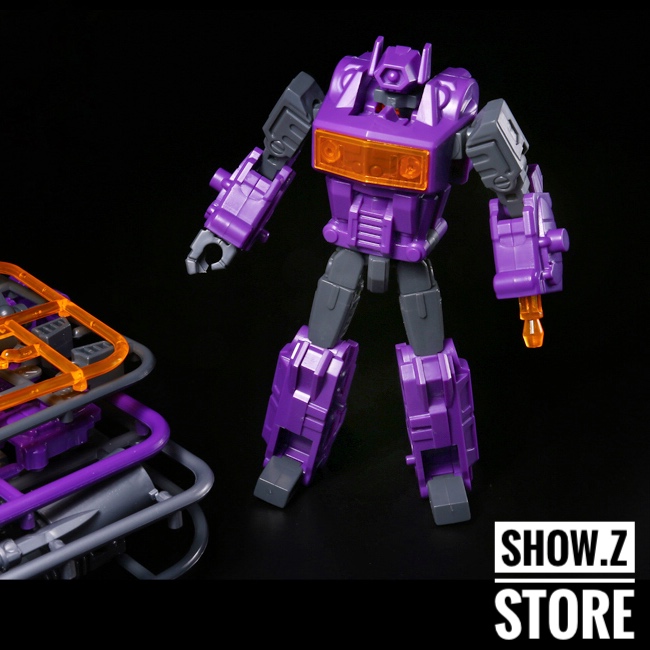 KuBianBao Shockwave Gunpla purple robot standing pose with orange chest KuBianBao Shockwave Gunpla purple robot standing pose with orange chest