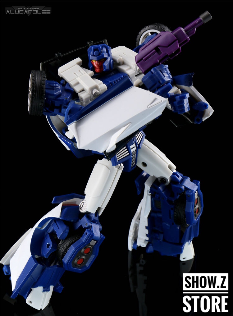 Blue and white robot transformation figure displayed on reflective surface Blue and white robot transformation figure displayed on reflective surface