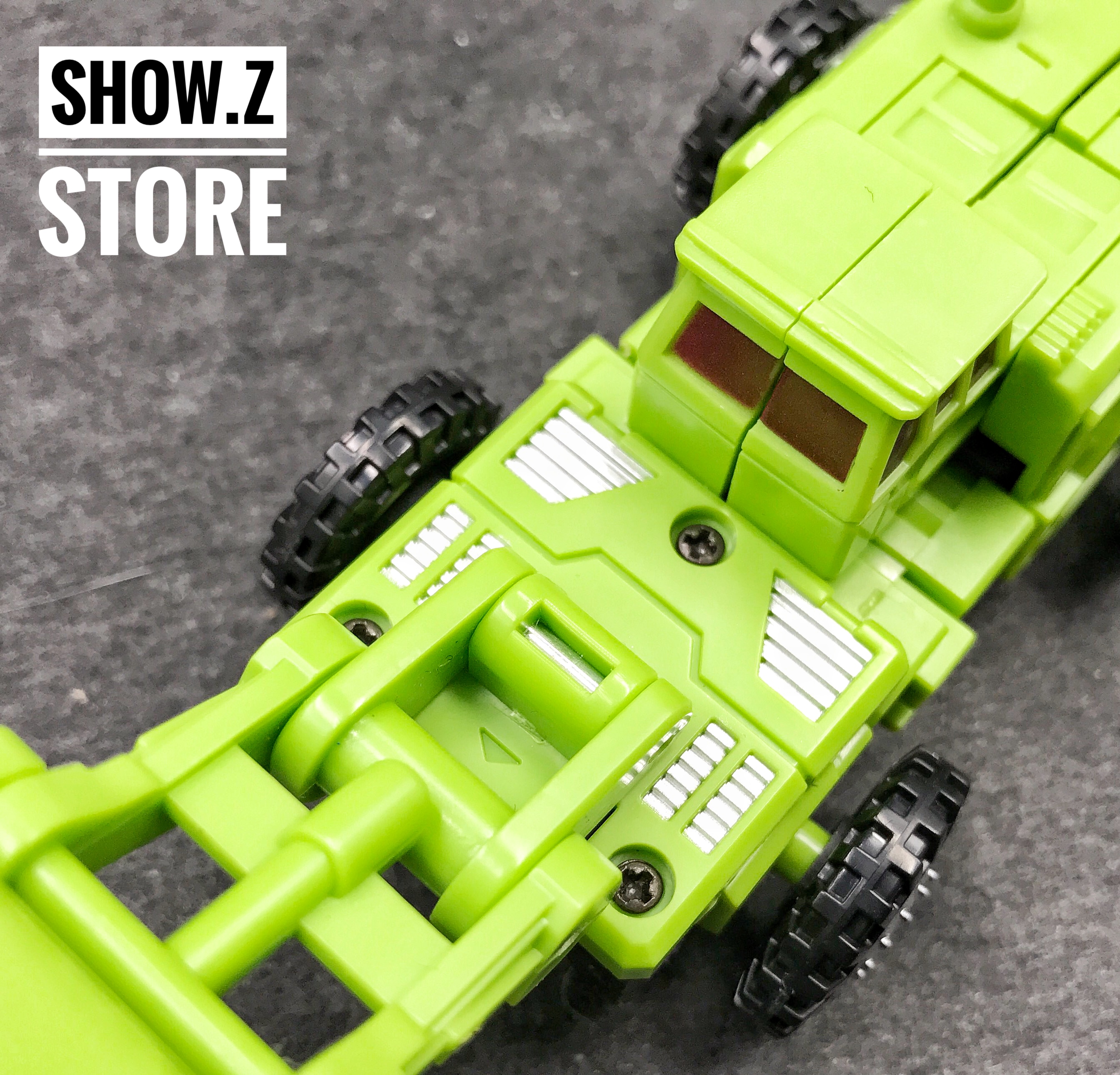 MechFansToys MF-17 Hercules complete green and purple figure transformation shown MechFansToys MF-17 Hercules complete green and purple figure transformation shown