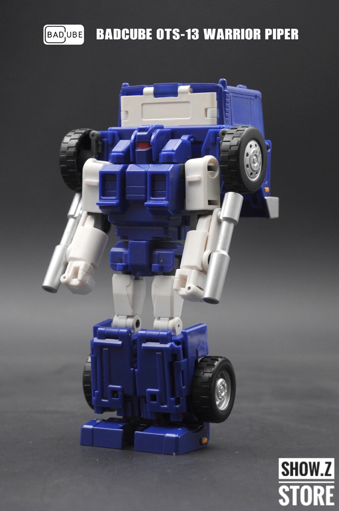 BadCube OTS-13 Piper blue white robot truck wheels visible form BadCube OTS-13 Piper blue white robot truck wheels visible form