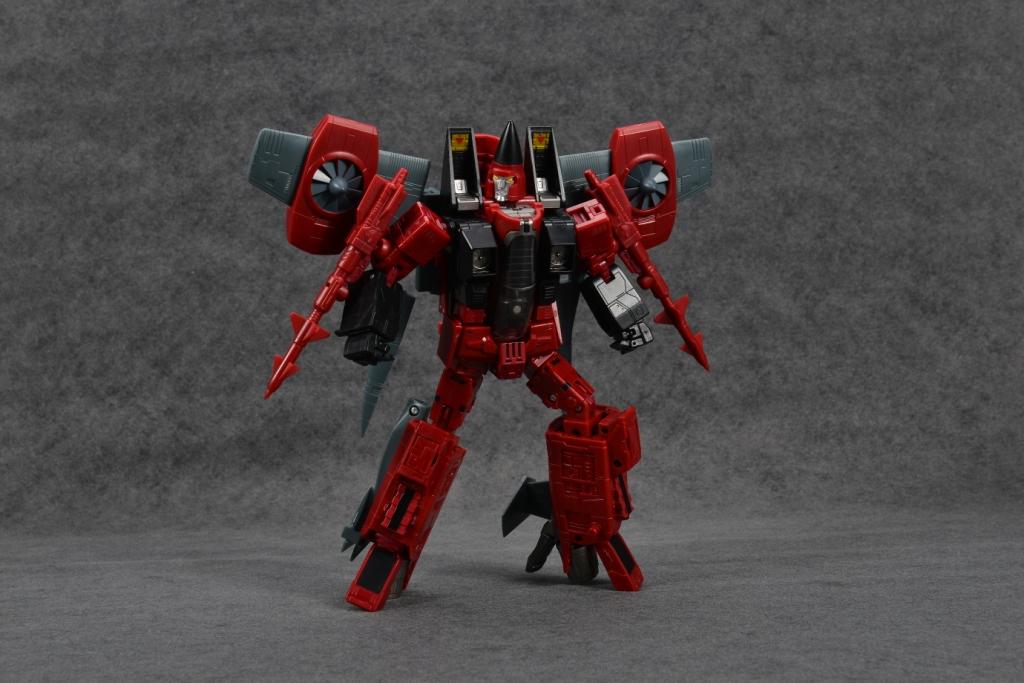 Yes Model Thrust robot standing arms wide bright red upper body Yes Model Thrust robot standing arms wide bright red upper body