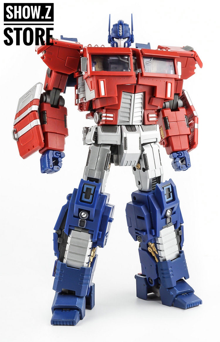 Generation Toy GT-03 Optimus Prime with cannon weapon side angle dynamic Generation Toy GT-03 Optimus Prime with cannon weapon side angle dynamic