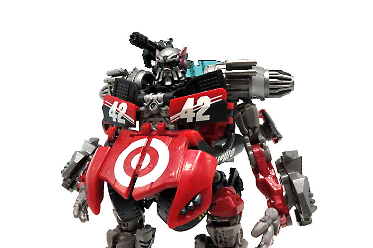 Detailed front view of red robot transformer with black accents Detailed front view of red robot transformer with black accents