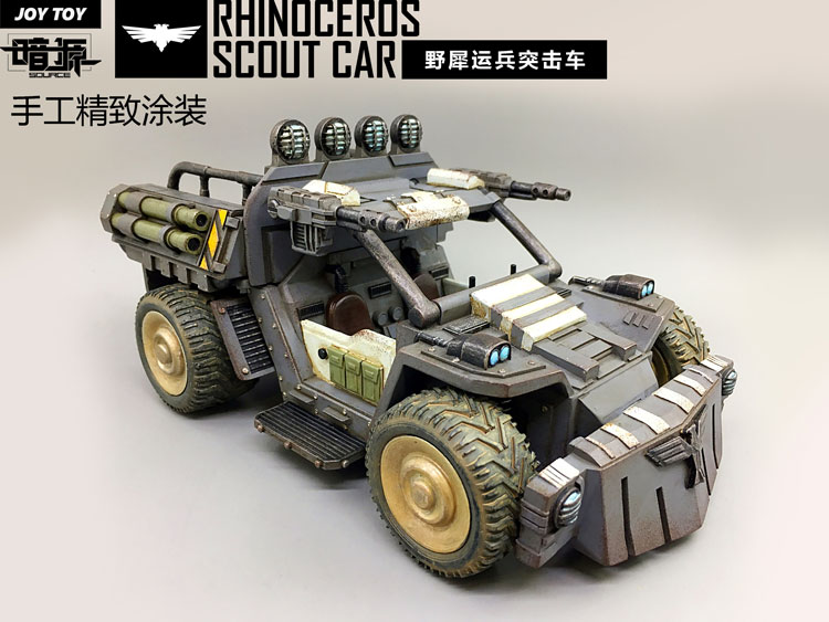 Detailed mechanical Rhinoceros Scout Car displaying camouflage paint scheme Detailed mechanical Rhinoceros Scout Car displaying camouflage paint scheme