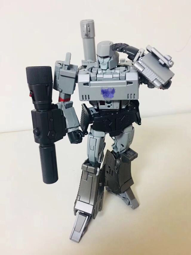 Gray Megatron figure in robot form with accessories Gray Megatron figure in robot form with accessories