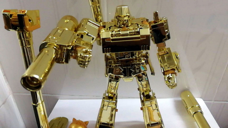 Gold chrome finish Mightron robot display Gold chrome finish Mightron robot display
