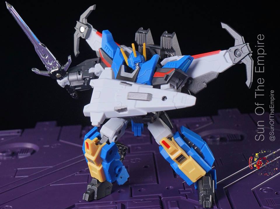 Robot holding sword demonstrating action poses Robot holding sword demonstrating action poses
