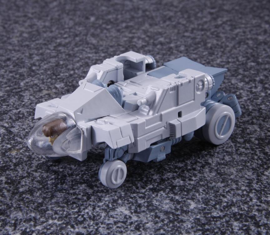 White robot companion figure next to yellow Bumblebee transformer White robot companion figure next to yellow Bumblebee transformer