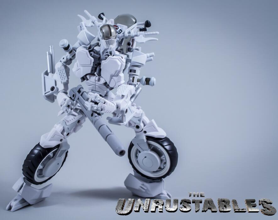 Urban combat-style robot with white armor and black tire wheel components Urban combat-style robot with white armor and black tire wheel components