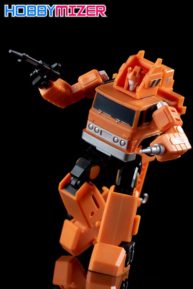 Orange articulated crane truck with grapple claw attachment Orange articulated crane truck with grapple claw attachment