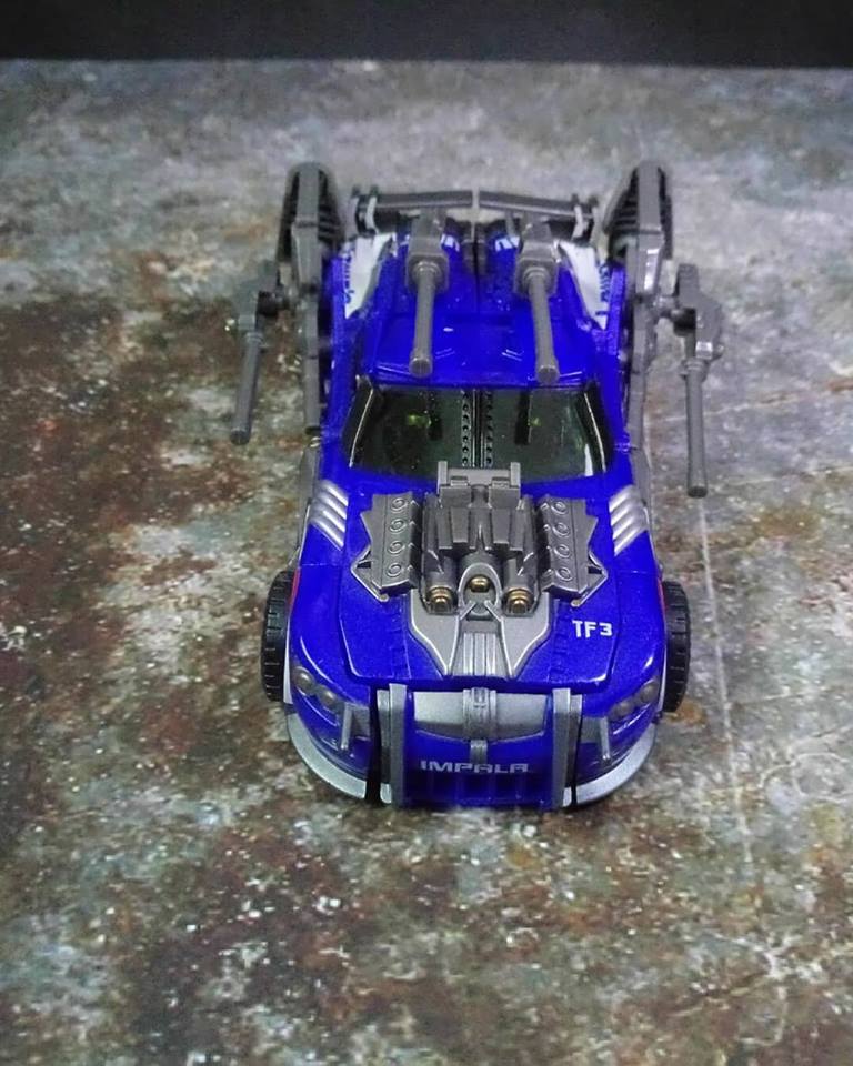 Blue transforming robot vehicle mode top view angle display Blue transforming robot vehicle mode top view angle display