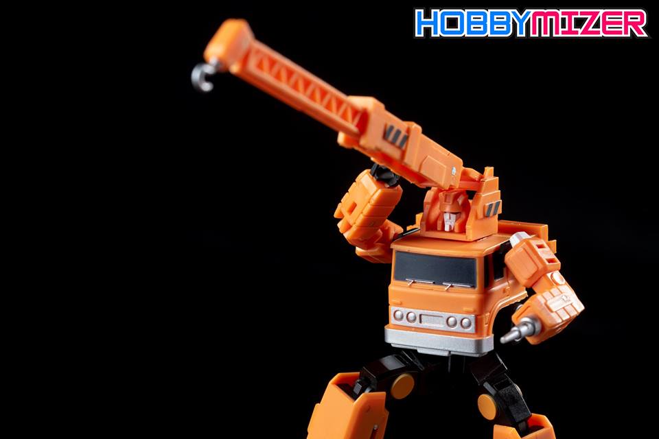 Orange construction crane robot in action pose Orange construction crane robot in action pose