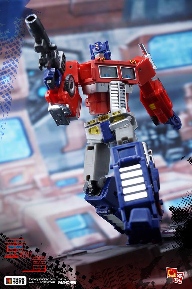 Red and blue truck-mode robot combiner with large cannon in action Red and blue truck-mode robot combiner with large cannon in action