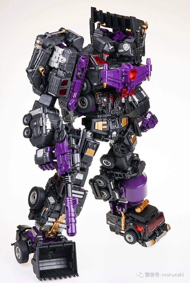 Purple black Devastator combiner with five component vehicles Purple black Devastator combiner with five component vehicles