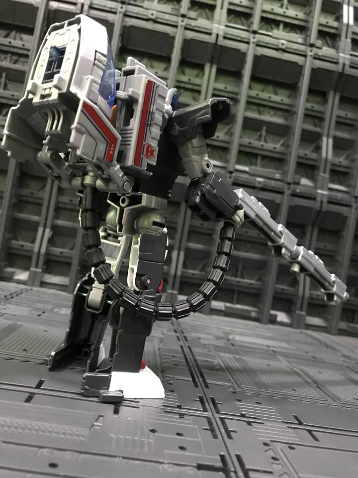 White robot form with red and blue faction markings shown White robot form with red and blue faction markings shown