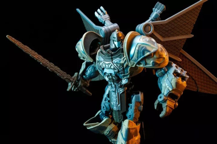 Blue robot with large mesh wings and orange leg armor Blue robot with large mesh wings and orange leg armor