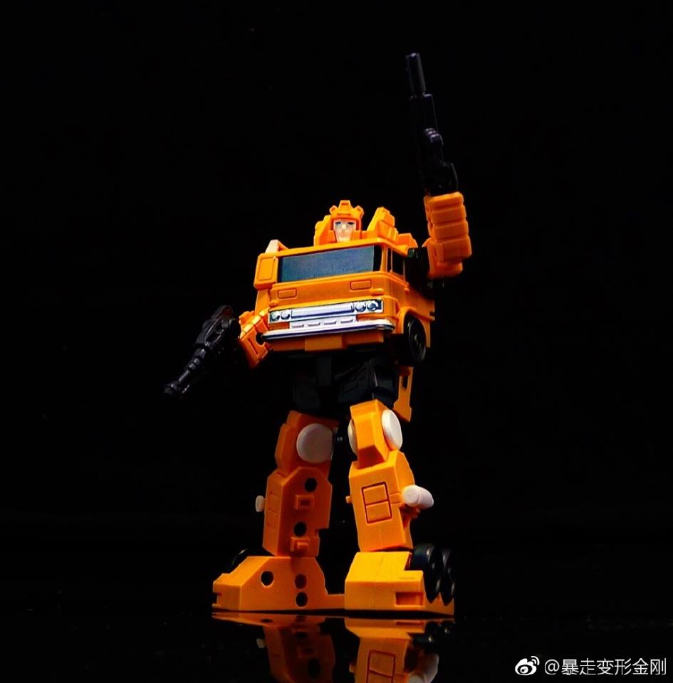 Orange construction truck transformer with articulated crane arm Orange construction truck transformer with articulated crane arm
