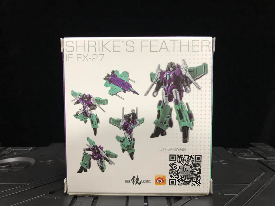 Shrike's Feather robot figure in purple body with green wing armor Shrike's Feather robot figure in purple body with green wing armor