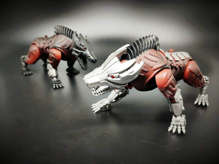 Red and white beast animal transformation robot with mechanical detailing Red and white beast animal transformation robot with mechanical detailing