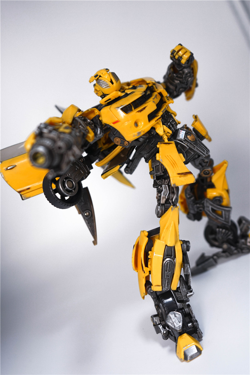 Yellow striped black mecha with detailed mechanical articulation Yellow striped black mecha with detailed mechanical articulation