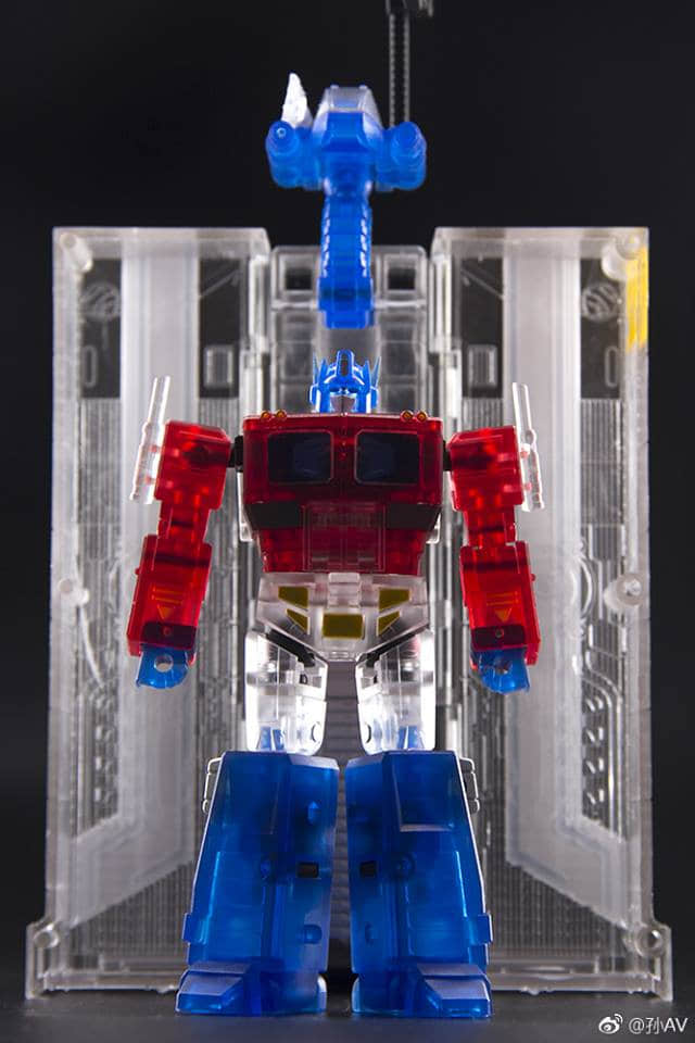 Optimus Prime in clear case showing full transformation components Optimus Prime in clear case showing full transformation components