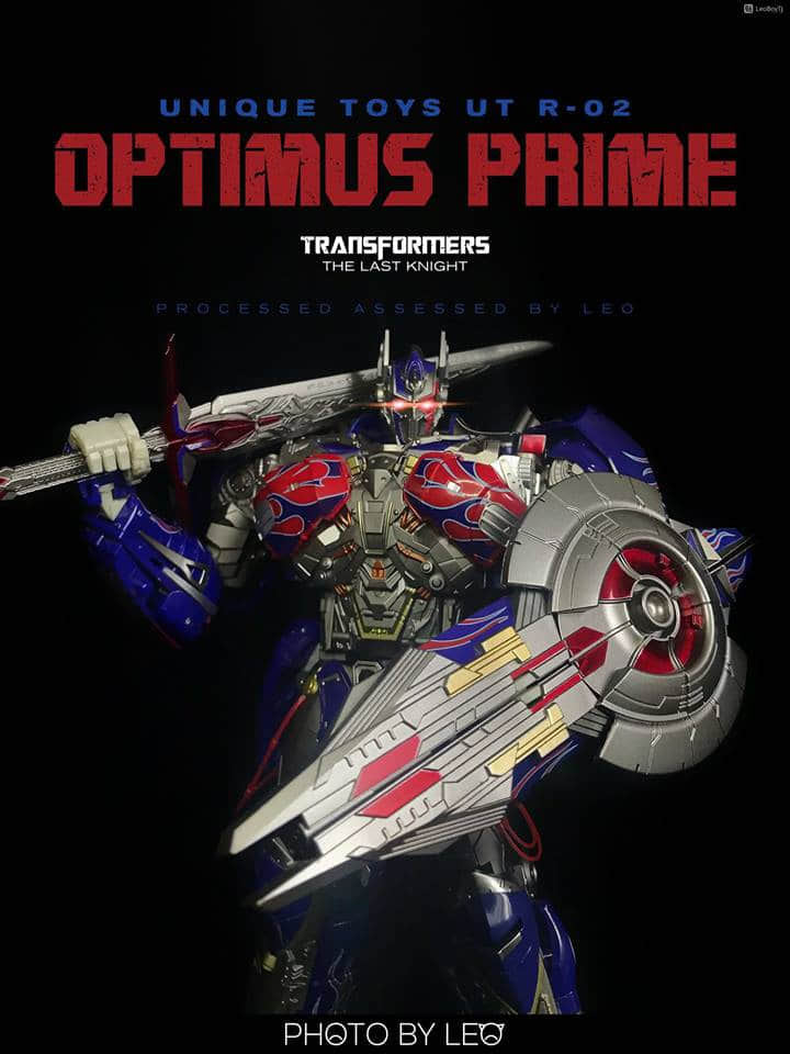 Premium robot toy holding large sword with dramatic lighting setup Premium robot toy holding large sword with dramatic lighting setup