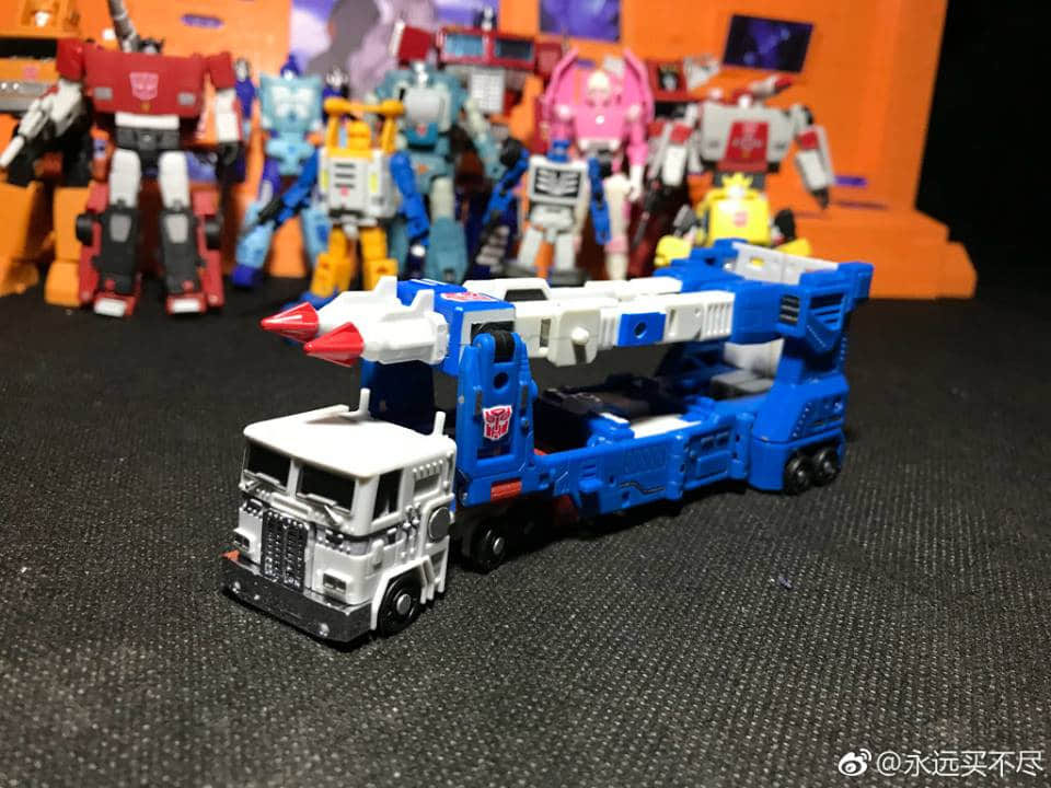 White and red military robot Ultra Magnus figure White and red military robot Ultra Magnus figure