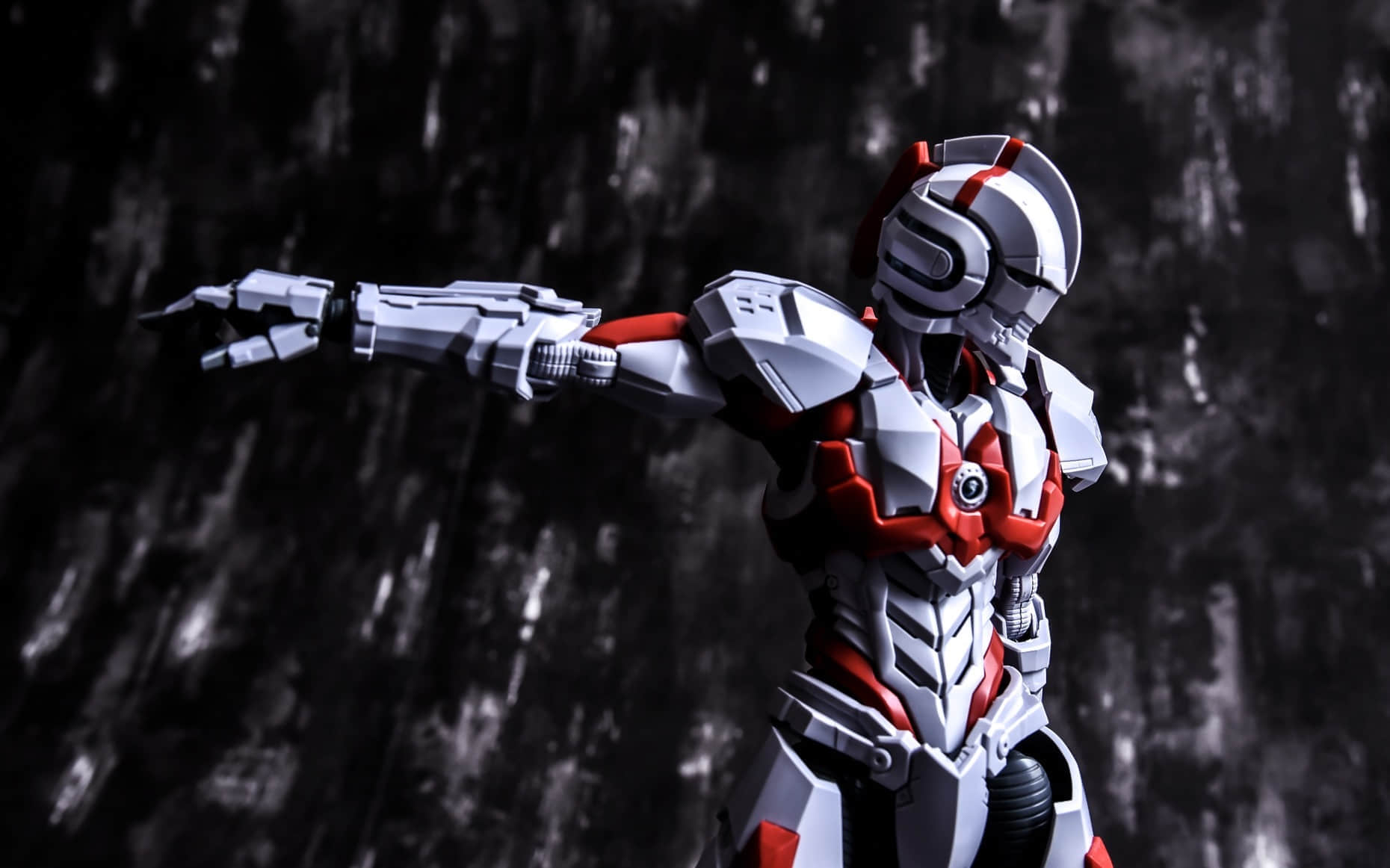 Ultraman action figure in dynamic firing pose with extended weapon Ultraman action figure in dynamic firing pose with extended weapon