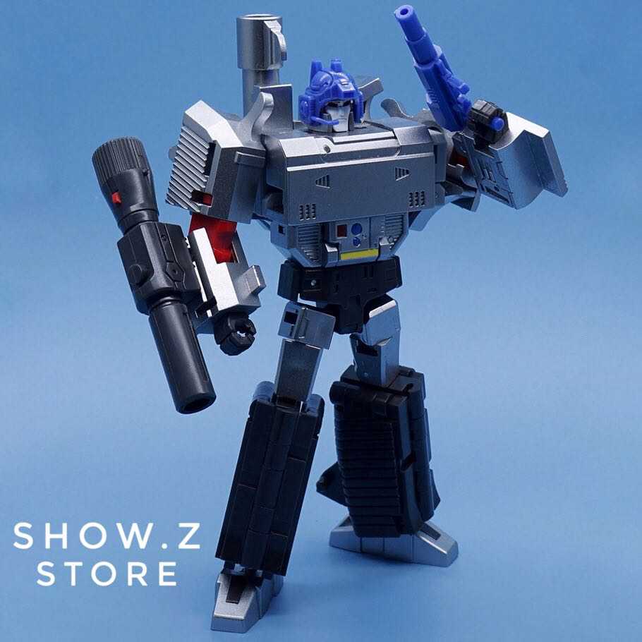 Metallic blue and white Megatron robot with cannon weapon standing pose Metallic blue and white Megatron robot with cannon weapon standing pose
