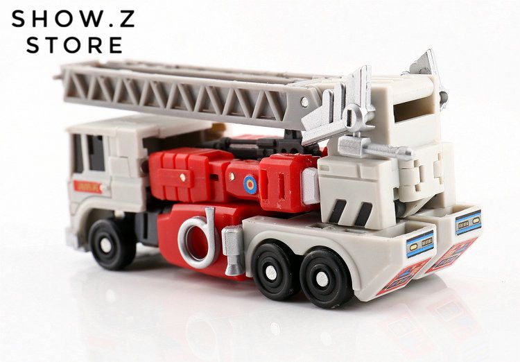 Emergency vehicle transforming into robot with extended equipment Emergency vehicle transforming into robot with extended equipment