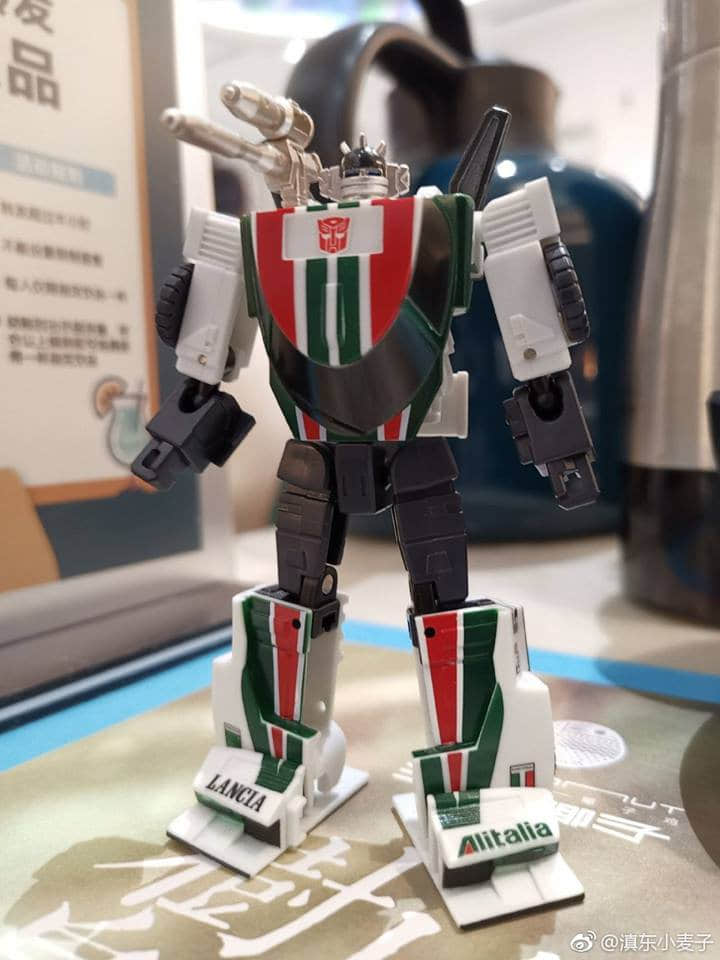 Whiskey Jack Transformer robot in white and green colors Whiskey Jack Transformer robot in white and green colors