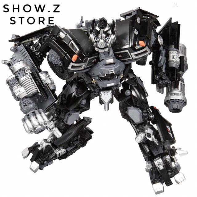 Black gray white robot figure with heavy armor plating Black gray white robot figure with heavy armor plating