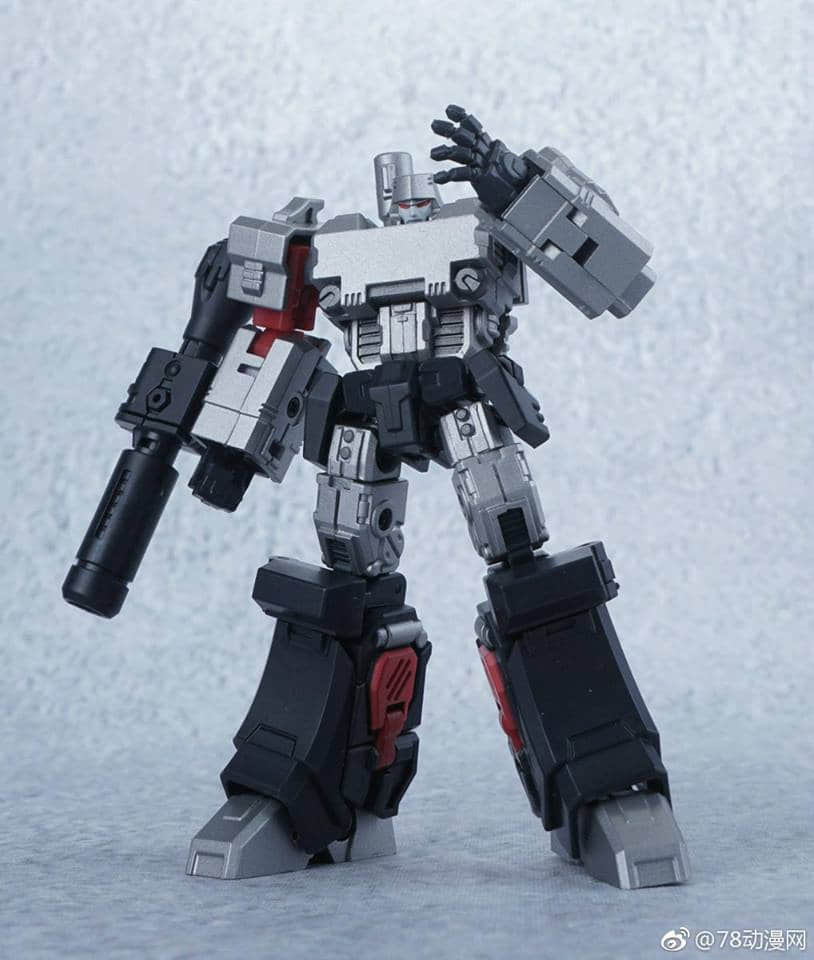 Black red armored robot in aggressive action position Black red armored robot in aggressive action position